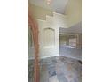 Inviting foyer with tile flooring and a view of the living room, setting a welcoming tone at 2747 Harper Woods Dr, Marietta, GA 30062