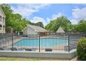 Community pool area features a pool house, grilling area, and ample lounge seating at 514 Mcgill Ne Pl, Atlanta, GA 30312
