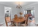 Open dining room offers seamless flow, views to living room, perfect for entertaining guests and Gathering gatherings at 564 Allana Ct, Stone Mountain, GA 30087