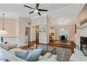 Inviting living space with hardwood floors, open layout, and seamless transition to kitchen and dining at 1087 Berkley Se Dr, Smyrna, GA 30082
