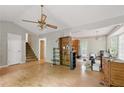 Spacious living room with hardwood floors and staircase at 4585 Muirwood Cir, Powder Springs, GA 30127