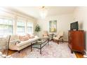 Inviting living room featuring stylish furnishings, elegant lighting, and a serene ambiance at 824 Greenwood Ne Ave # 9, Atlanta, GA 30306