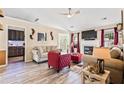 Inviting living room with fireplace, hardwood floors, and comfortable seating at 1543 Blossom Dr, Atlanta, GA 30349