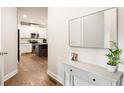 Inviting entryway with hardwood floors and view of the kitchen at 1603 Glen Ivy, Marietta, GA 30062