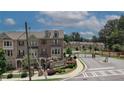 Overhead view of Clairebrooke community with manicured lawns and secure gated entry at 2530 Clairebrooke Bend, Atlanta, GA 30341
