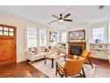 Cozy living room with hardwood floors, fireplace, and comfortable seating, perfect for relaxation at 2056 Hosea L Williams Ne Dr, Atlanta, GA 30317