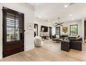 Spacious living room with hardwood floors, fireplace, and ample natural light at 132 Grand Cres, Alpharetta, GA 30009