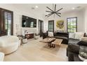 Comfortable living room with a cozy fireplace, modern decor, and plenty of seating at 132 Grand Cres, Alpharetta, GA 30009