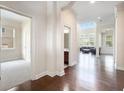 Bright foyer features hardwood floors and entry to living spaces at 585 Lawton Bridge Sw Rd, Smyrna, GA 30082
