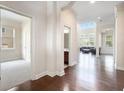 Bright hallway showcasing hardwood floors and architectural details at 585 Lawton Bridge Sw Rd, Smyrna, GA 30082