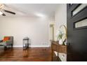 Bright living room featuring hardwood floors and modern decor elements at 863 Needle Rock Dr, Stonecrest, GA 30083