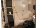 Bathroom featuring a shower/tub combination, and built in shelving at 901 Mayson Turner Nw Rd, Atlanta, GA 30314