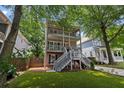 Beautiful home with a well-manicured lawn and double porches offering great curb appeal at 944 Herndon Nw St, Atlanta, GA 30318