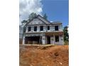 Under construction two-story home with ladder and visible framework showcasing building progress at 324 Bloomfield Cir, Canton, GA 30114