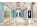 Open concept living space featuring tile floors and walls painted with a soft muted green at 6065 Standard View Dr, Duluth, GA 30097
