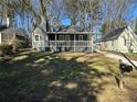 Cute single Gathering house with a covered porch, nice yard, and mailbox at street at 1457 Richland Road Southwest, Atlanta, GA 30310