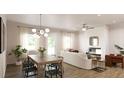 Open-concept living and dining area with hardwood floors, fireplace, and plenty of natural light at 55 Alameda St # 6, Loganville, GA 30052