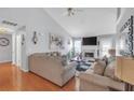 Cozy living room with high ceilings, hardwood floors and a fireplace at 3383 Spirit Nw Dr, Kennesaw, GA 30144