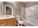 Bright bathroom featuring a clean white tub/shower combo, light wood vanity, and neutral wall color at 2289 Strathmoor Manor Dr, Lithonia, GA 30058