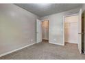 Neutral bedroom with carpet and two closets for ample storage at 2289 Strathmoor Manor Dr, Lithonia, GA 30058