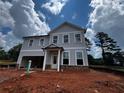 Charming two-story home with gray siding, white trim and a welcoming front porch at 1716 Hickory Heights (Lot 2) Way, Acworth, GA 30102