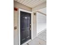 Close-up of a well-maintained front door providing secure access to the property at 4248 River Green Nw Dr # 310, Atlanta, GA 30327