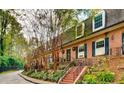 Charming brick townhomes featuring well-manicured landscaping at 1261 Lavista Ne Rd # M-4, Atlanta, GA 30324