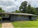 A well-maintained home with a carport and a neatly landscaped front yard at 3551 Clay Rd, Austell, GA 30106