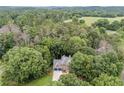 Aerial view of a home surrounded by a lush forest landscape at 41 Wexford Nw Cir, Cartersville, GA 30121