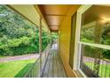 View of the balcony featuring wood floors, white railings and an exterior view of the community at 1177 Castle Way Way, Norcross, GA 30093