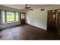 Bright living room with bay window and classic hardwood flooring at 2588 Sandtown Sw Rd, Marietta, GA 30060