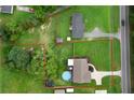 Aerial view of the property highlighting the pool and spacious backyard at 521 Peeples Valley Nw Rd, Cartersville, GA 30121