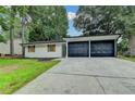 Charming single-story home with a well-maintained lawn and a two-car garage at 2508 Wagon Trce, Duluth, GA 30096