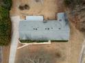 Overhead shot of gray roof, driveway, and landscaped yard at 3421 Fawn Trl, Marietta, GA 30066