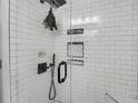 Modern bathroom featuring sleek subway tile shower with rainfall showerhead and glass door at 314 3Rd Ne St # 4, Atlanta, GA 30308