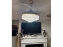 Living room featuring a modern fireplace, television, and a stylish chandelier at 314 3Rd Ne St # 4, Atlanta, GA 30308
