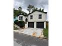 Beautiful two-story home featuring a fresh exterior paint, new windows, and a two car garage at 1340 Stoneleigh Way, Stone Mountain, GA 30088