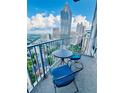 Balcony offers city views with a seating area, perfect for relaxing outdoors at 400 W Peachtree Nw St # 3412, Atlanta, GA 30308
