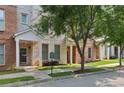 Attractive townhouses with brick facade, manicured lawn, and street view at 761 Liberty Commons Nw Dr, Atlanta, GA 30314