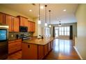 Modern kitchen with granite counters, stainless appliances, and an open floor plan at 1668 Sabastian Ne Pt, Atlanta, GA 30329