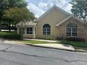 Charming property featuring a partial stone facade, manicured greenery, and a sidewalk, set on a peaceful residential street at 2191 Rockbridge Road # 2603, Stone Mountain, GA 30087