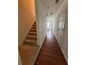 Welcoming entryway with hardwood floors leading to the upper level at 6231 Redan Overlook, Lithonia, GA 30058