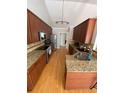 A stylish kitchen is equipped with granite countertops and stainless steel appliances at 2517 Oak Valley Ln, Dacula, GA 30019
