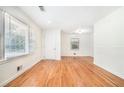 Bright living room with hardwood floors and large windows at 2875 Monterey Dr, Decatur, GA 30032