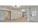 Inviting living room with sleek lighting, modern wainscoting, and an open layout at 2254 Glendale Dr, Decatur, GA 30032