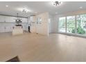 Open-concept living area features a seamless flow into the kitchen at 2254 Glendale Dr, Decatur, GA 30032