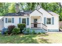 Quaint one-story home with a covered porch and a tidy, inviting yard at 3261 N Fulton Ave, Atlanta, GA 30354