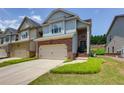 Charming brick and siding townhome with a two-car garage and well-maintained lawn at 2968 Oshields Sw Ct # 4, Marietta, GA 30060