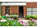 Building exterior with a private entrance, staircase, and greenery at 791 Wylie Se St # 404, Atlanta, GA 30316