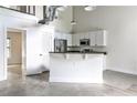Bright kitchen with stainless steel appliances and a kitchen island at 791 Wylie Se St # 404, Atlanta, GA 30316